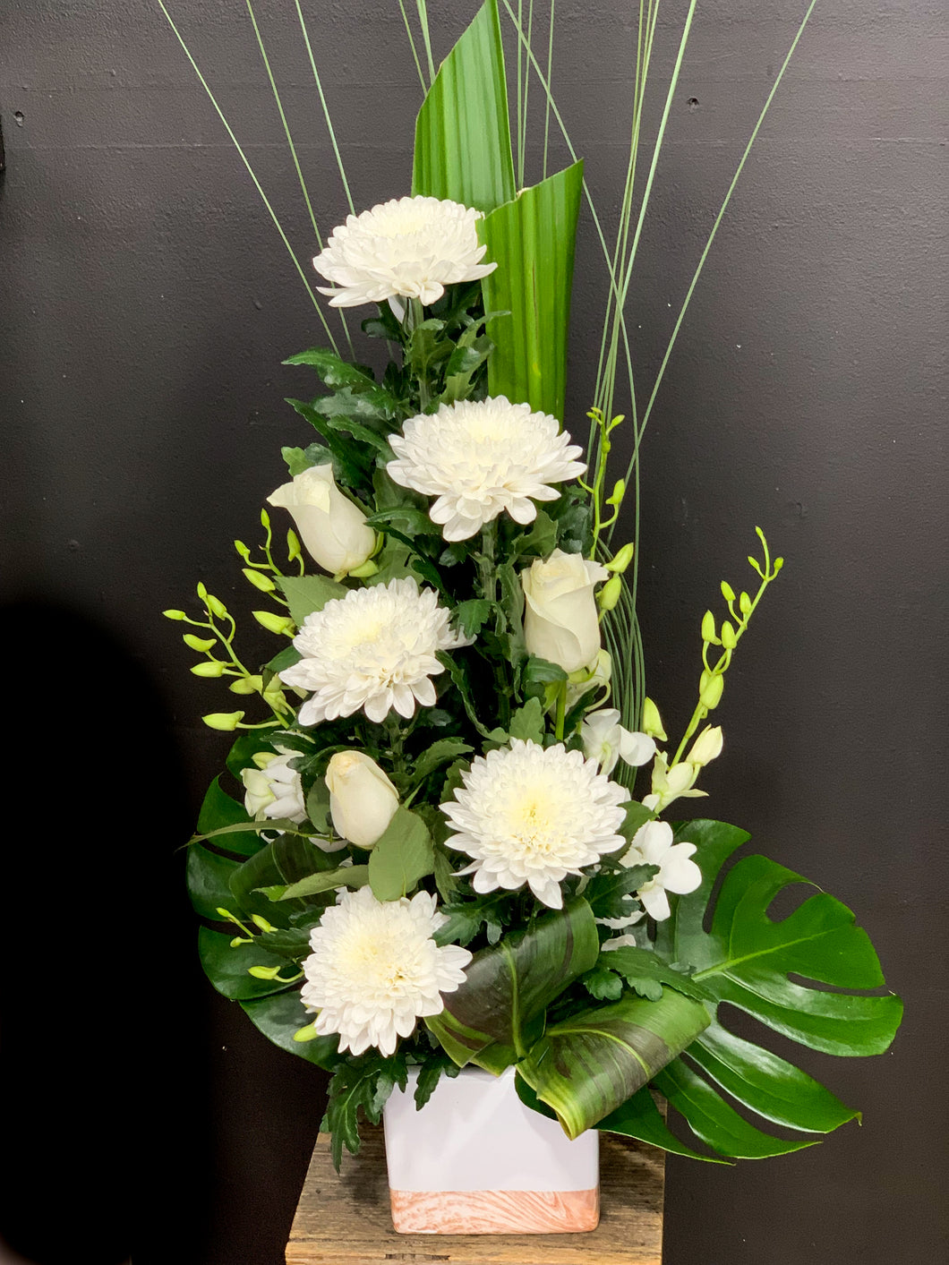 Simply white arrangement in ceramic pot